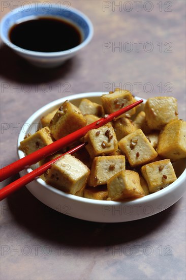 Fried tofu cubes in bowl