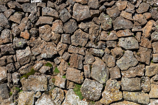 Stone wall of old lava rock