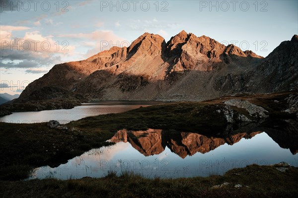 Sunset with mountains and reflection towards Obere Seescharte and Wangenitzsee