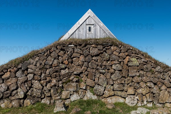 Lonely hut with stone wall