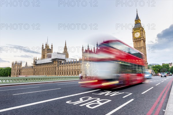 Red double-decker bus on the Westminster Bridge