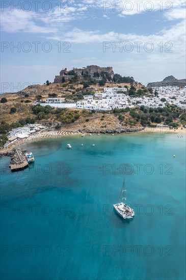 Sailing boat on turquoise sea