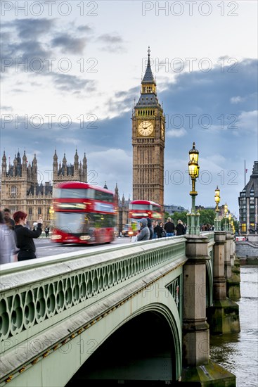 View of Westminster Bridge with red buses