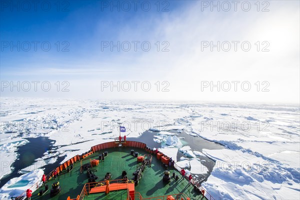 Fog bow or white rainbow in the ice around the North Pole