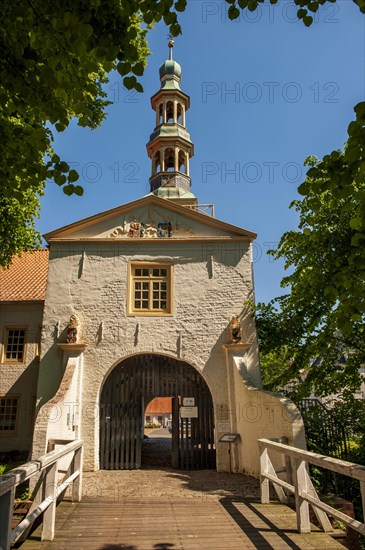 Gatehouse to the moated castle Norderburg in the historic centre of Dornum