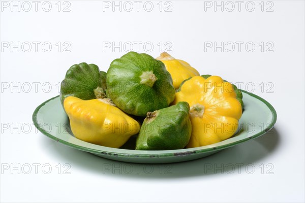 Patisson pumpkins on plate