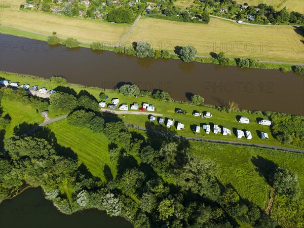 Drone shot of the river Weser with RV park near Holzminden