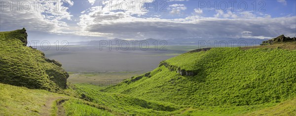 View from Hjoerleifshoefdi (Viking grave) over wide lava sand area to Vik