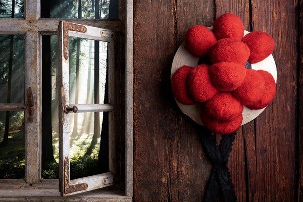 Rustic farmhouse parlor with Bollen hat and view out of the window into the landscape