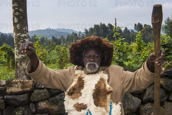 Old man preparing local herbs on a Ceremony of former poachers