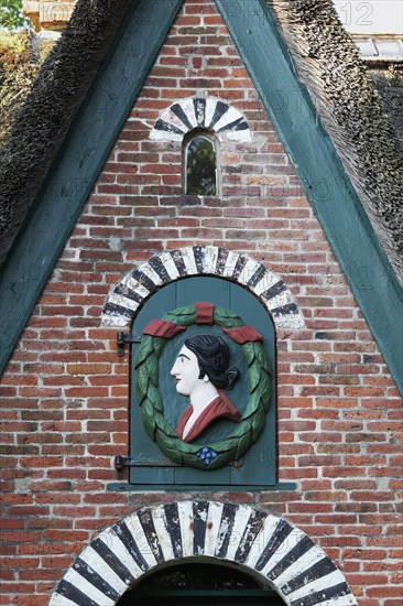 Bust of a woman with laurel wreath