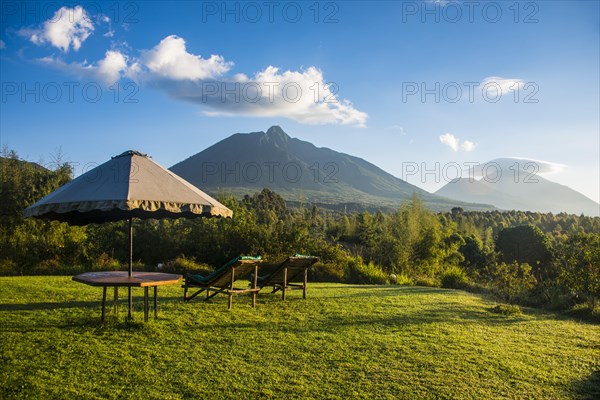 Sun umbrella and loungers in a luxury hotel in the Virunga National Park