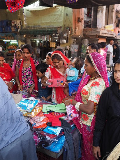 Customers check textiles