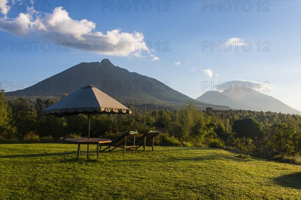 Sun umbrella and loungers in a luxury hotel in the Virunga National Park