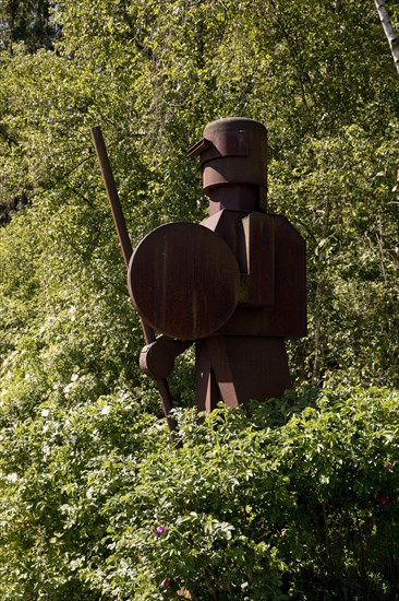 Iron sculpture entitled Guardian by Anatol Herzfeld