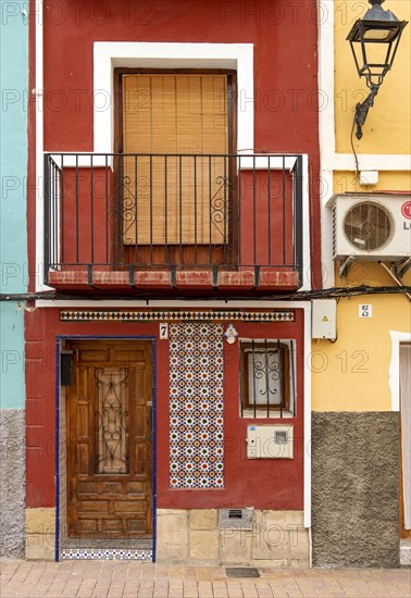 Close-up of colorful windows and doors of fishermen's houses in Villajoyosa