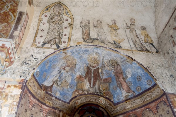 Wall paintings in the painted church of Saulcet