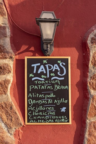 Tapas Menu on Chalkboard at Restaurant in Villajoyosa