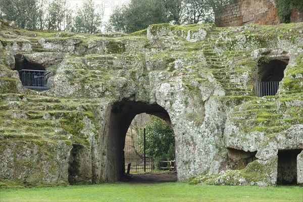 Roman amphitheatre carved out of the tufa