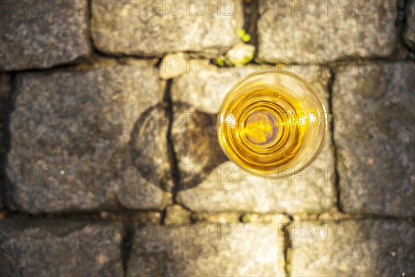 Close up of small glass of white port wine