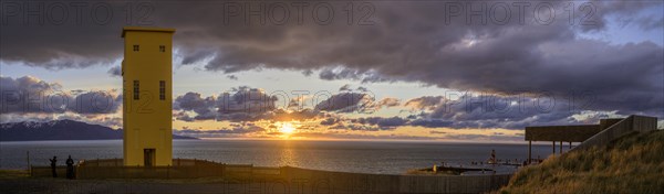 Lighthouse and Geosea Thermal Bath at sunset