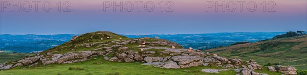 Sunset over fields in Haytor Rocks