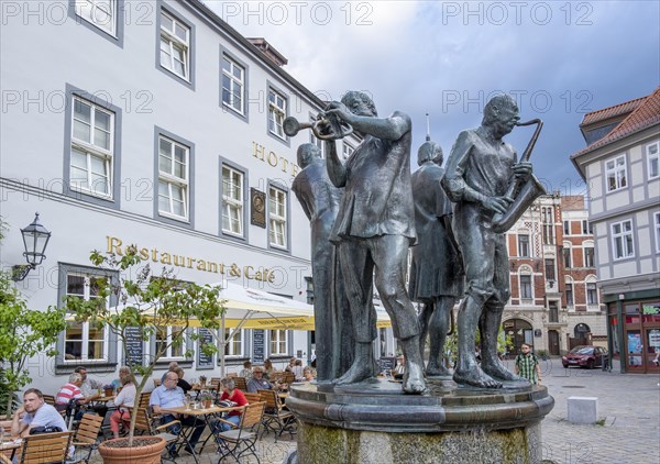 Sculpture Muenzenberger Musikanten on the fountain at the market place in Quedlinburg