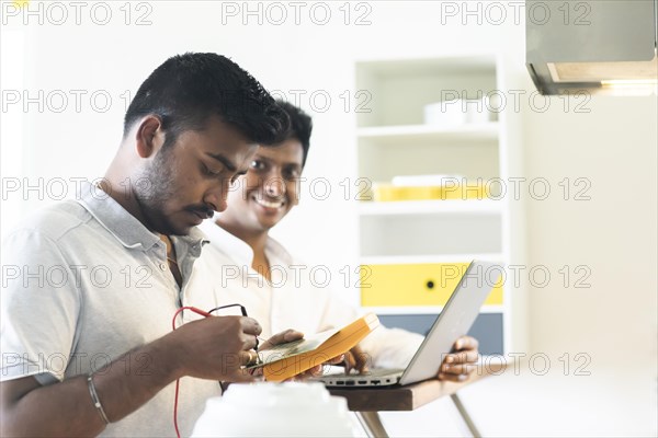 Students in an internship at the university with work equipment