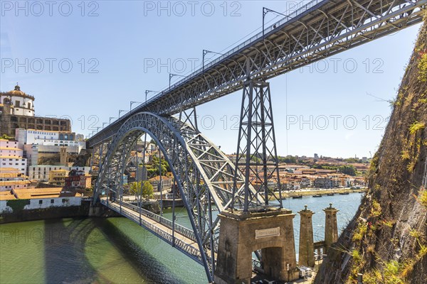 Beautiful iron Dom Luis I bridge over Douro river in Porto