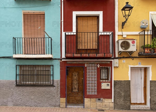 Close-up of colorful windows and doors of fishermen's houses in Villajoyosa