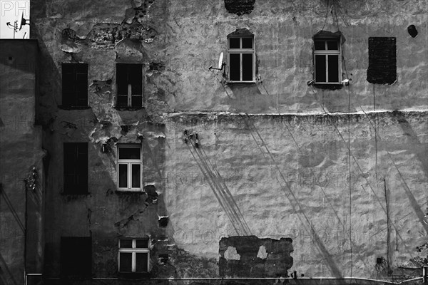 Facade of a decaying building in a small town