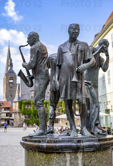 Sculpture Muenzenberger Musikanten on the fountain at the market place in Quedlinburg