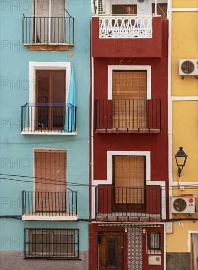 Close-up of colorful windows and balconies of fishermen's houses in Villajoyosa