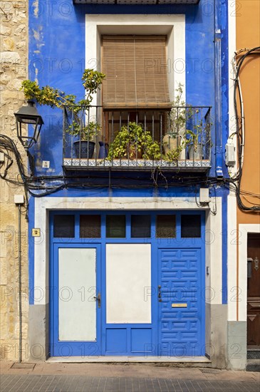 Close-up of colorful windows and doors of fishermen's houses in Villajoyosa