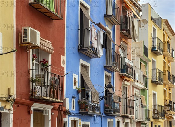 Close-up of colorful windows and balconies of fishermen's houses in Villajoyosa