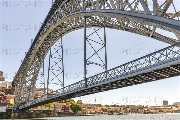 Beautiful iron Dom Luis I bridge over Douro river in Porto