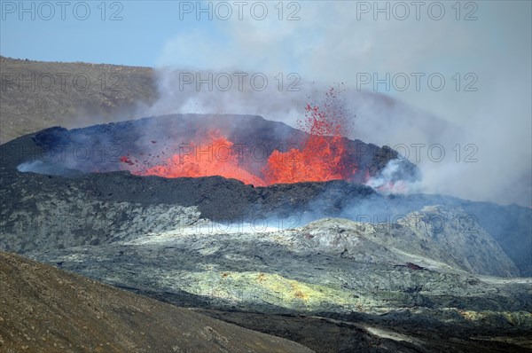 Active volcano with lava fountains