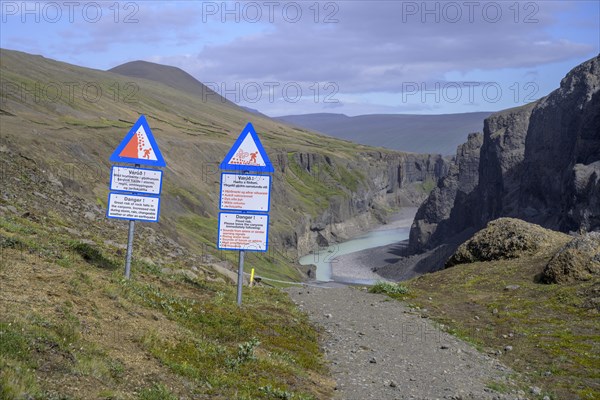 Warning signs at the canyon of Joekulsa a Bru below Karahnjukar dam