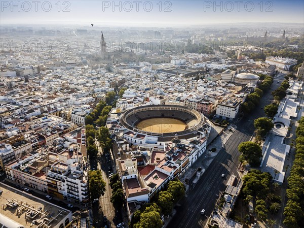 Aerial view of Seville with visible bullring and cathedral tower