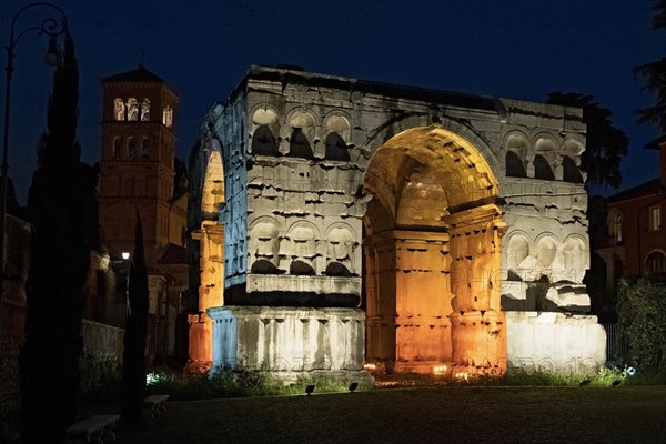 Illuminated Arch of Janus at night