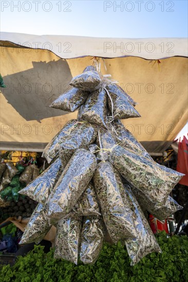 Dry herbs bags ready to prepare famous mint tea sold on market in Marrakech