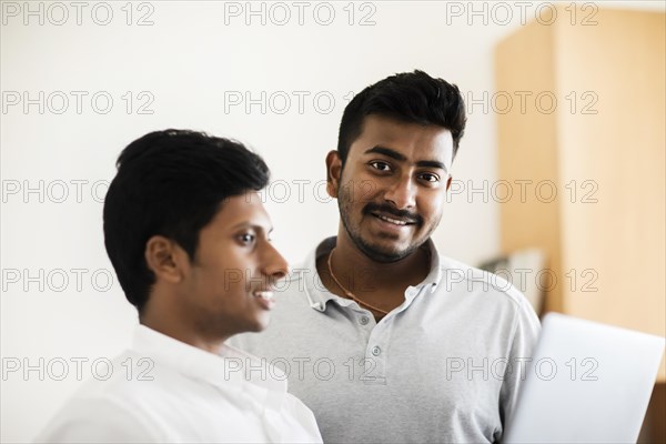 Students with laptop at the university