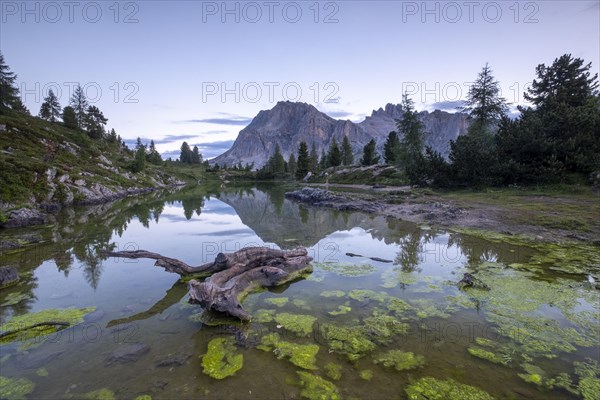 Morning atmosphere at the lake Lago de Limides and Tofana di Rozes