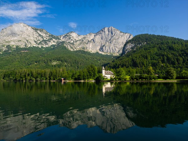 Grundlsee Castle against a mountain backdrop