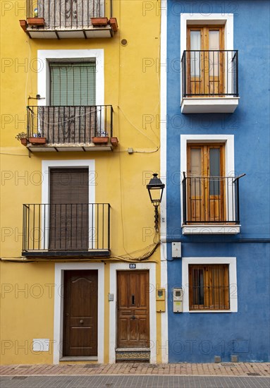 Close-up of colorful windows and doors of fishermen's houses in Villajoyosa