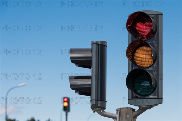 Traffic light with red heart