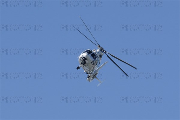 Helicopter with emergency doctor crew takes off during car race