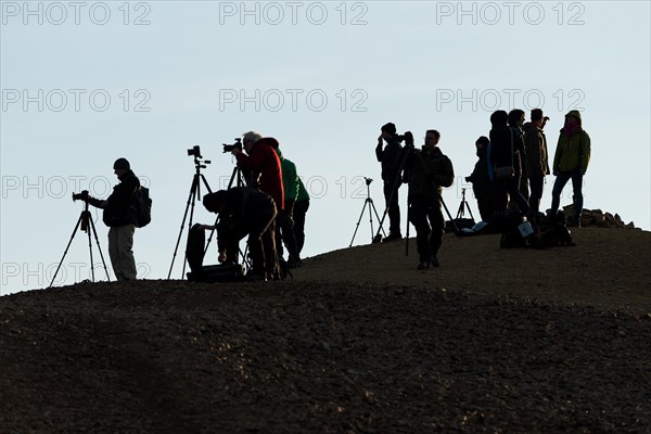 Photographers with tripods