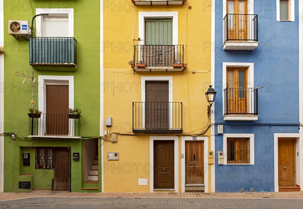 Close-up of colorful windows and doors of fishermen's houses in Villajoyosa