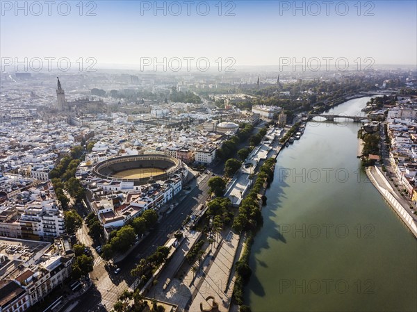 Aerial view of Seville with visible bullring and cathedral tower